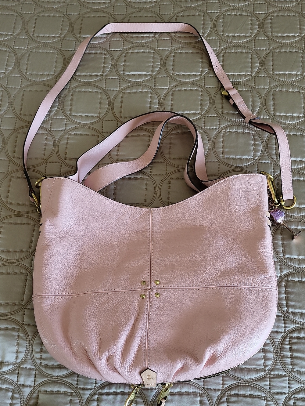 orYANY Pale Pink Leather Shoulder Hobo Bag with Gold-Tone Accents.
